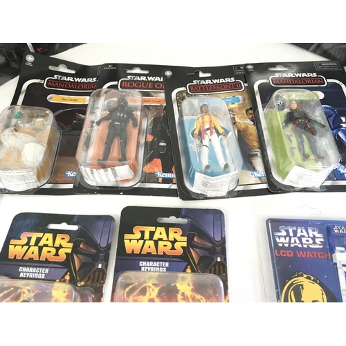 46 - A collection of of modern Star Wars figures..a watch and toy