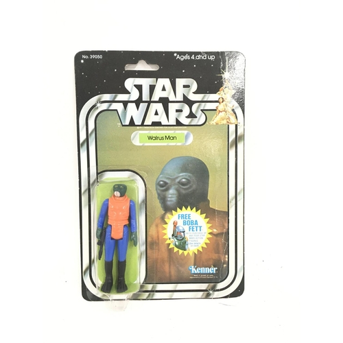 49 - A Carded Vintage Star Wars Walrus Man. With Boba Fett offer.