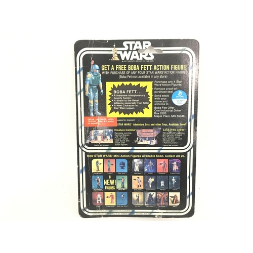 49 - A Carded Vintage Star Wars Walrus Man. With Boba Fett offer.