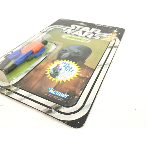 49 - A Carded Vintage Star Wars Walrus Man. With Boba Fett offer.