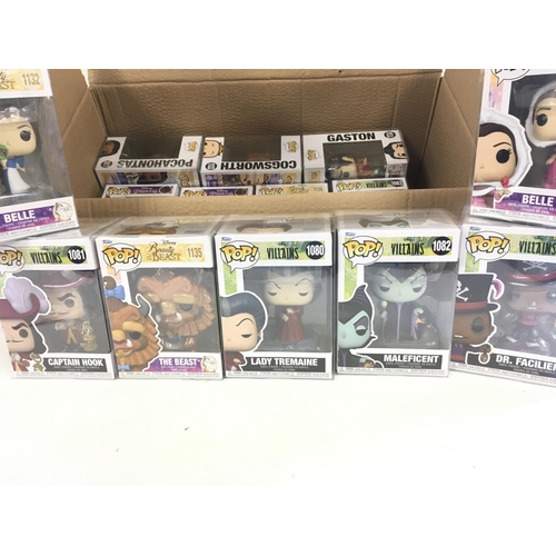 53 - A collection of 16 POP figures all Disney themed.