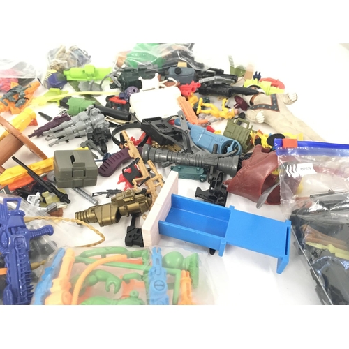 56 - A collection of 1980s and 1990s assorted accessories from numerous toy lines