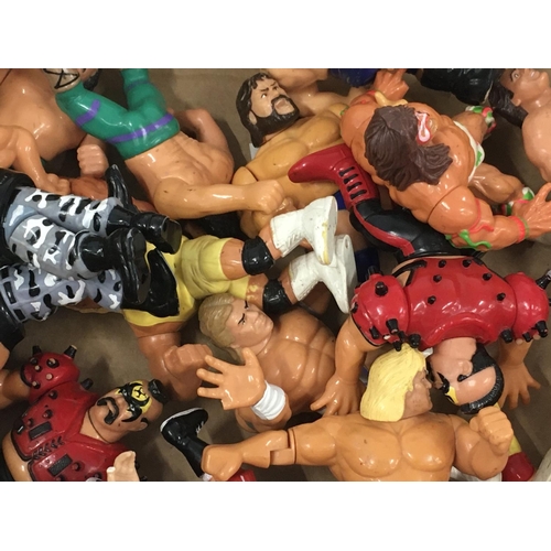 57 - A collection of 22 Hasbro WWF figures