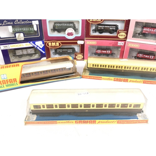 589 - A Collection of Boxed 00 Gauge Wagons and Coaches. Including Hornby. GMR. Grafar Etc.