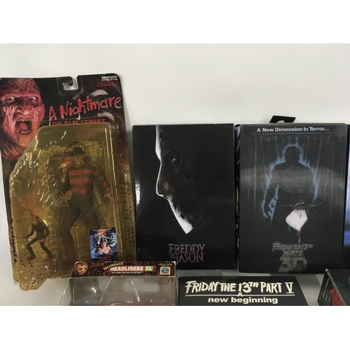 62 - A collection of 10 boxed Horror related action figures.