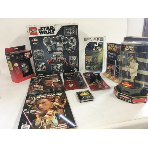 67 - A collection of Star Wars toys and Lego.