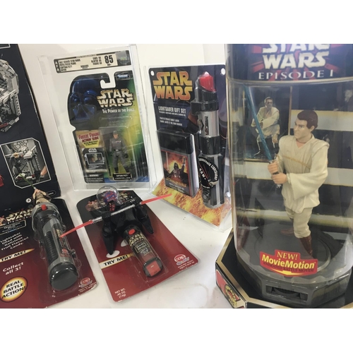 67 - A collection of Star Wars toys and Lego.