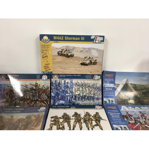 80 - A collection of new model kits by Italeri ..IMEX..Tamiya..and others. Mostly military related.