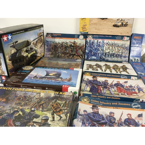 80 - A collection of new model kits by Italeri ..IMEX..Tamiya..and others. Mostly military related.