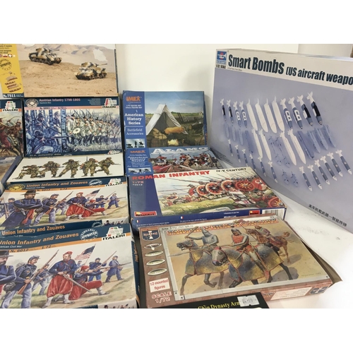 80 - A collection of new model kits by Italeri ..IMEX..Tamiya..and others. Mostly military related.