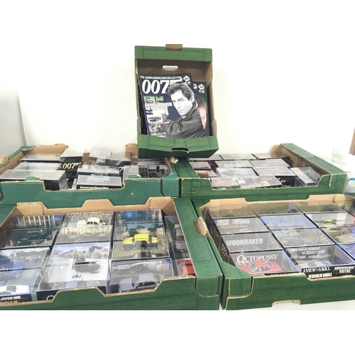 89 - A collection in excess of 75 James Bond 007 cars all in display boxes complete with approximately 13... 