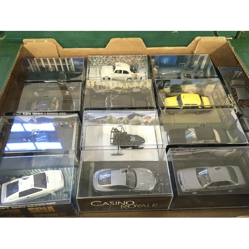 89 - A collection in excess of 75 James Bond 007 cars all in display boxes complete with approximately 13... 