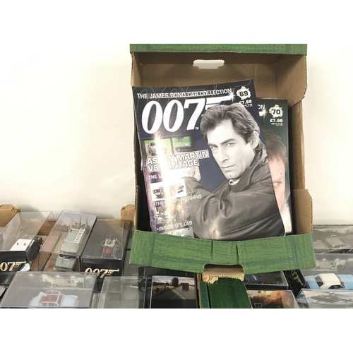 89 - A collection in excess of 75 James Bond 007 cars all in display boxes complete with approximately 13... 