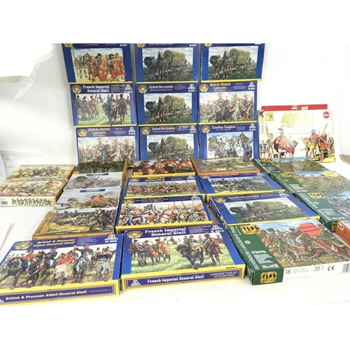 93 - A collection in of 29 boxed model military soldiers and accessories through the ages. Manufacturers ... 