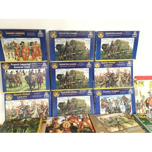 93 - A collection in of 29 boxed model military soldiers and accessories through the ages. Manufacturers ... 