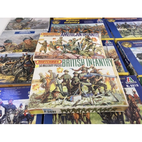 93 - A collection in of 29 boxed model military soldiers and accessories through the ages. Manufacturers ... 