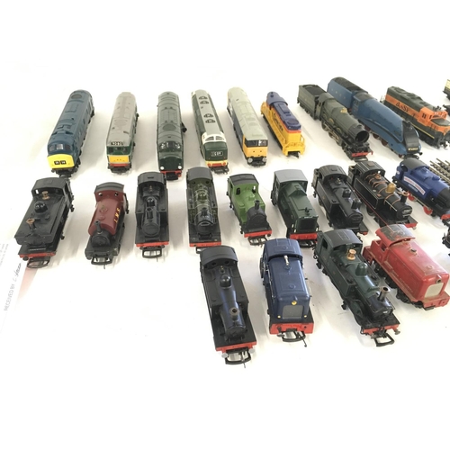 97 - A collection of model railway engines..carriages ..wagons and track. All 00 gauge. Makers include Ho... 