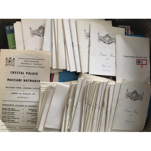 165 - Crystal Palace Football Programmes: Small suitcase of programmes with just over 50 being the small h... 