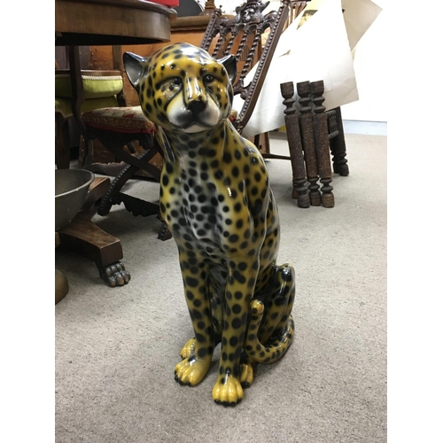 1016 - A mid 20th century ceramic Leopard. 60cm tall. This lot cannot be posted