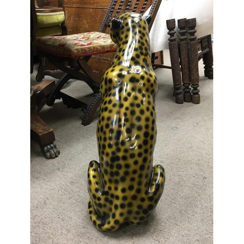 1016 - A mid 20th century ceramic Leopard. 60cm tall. This lot cannot be posted