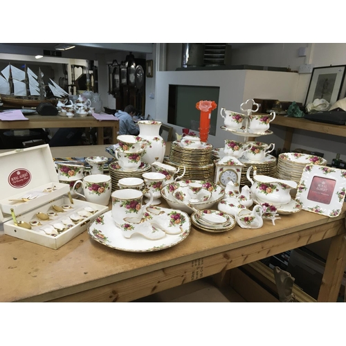 1017 - A large collection of Royal Albert Old English Country Roses tea and dinner service set- including h... 