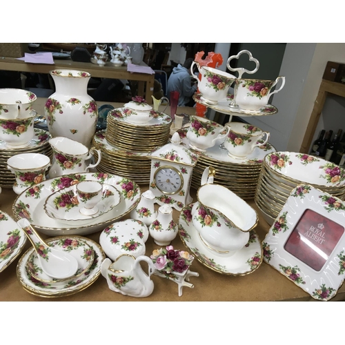 1017 - A large collection of Royal Albert Old English Country Roses tea and dinner service set- including h... 