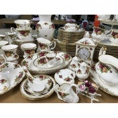 1017 - A large collection of Royal Albert Old English Country Roses tea and dinner service set- including h... 