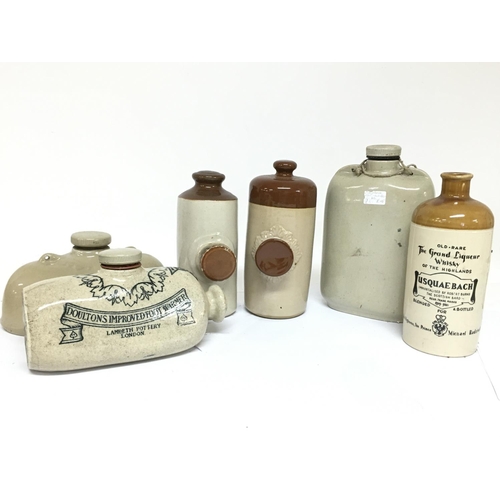 1021 - A Collection of stoneware bottles including a Usquaebach Scottish whisky bottle, Doulton Improved fo... 