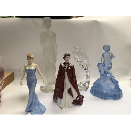 1038 - A mixed lot including a royal Doulton lady Diana figure and a royal Worcester Queen Elizabeth figure... 