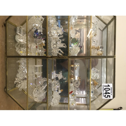 1045 - A Collection of six small display cabinets containing thimbles and crystals ornaments.