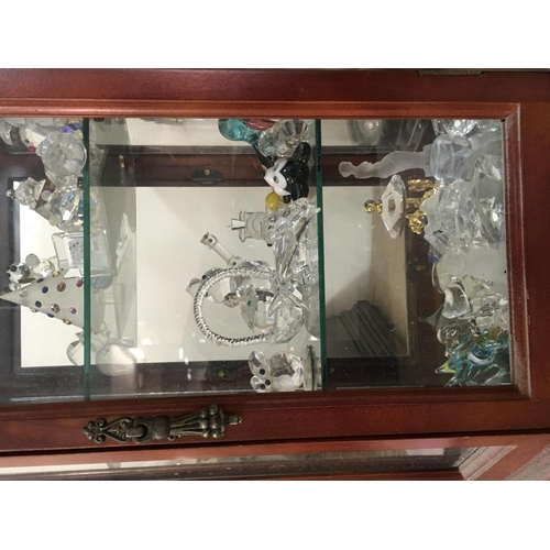 1045 - A Collection of six small display cabinets containing thimbles and crystals ornaments.