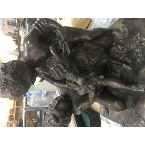 1048 - A bronze classical figure group depicting cherubs and goat .