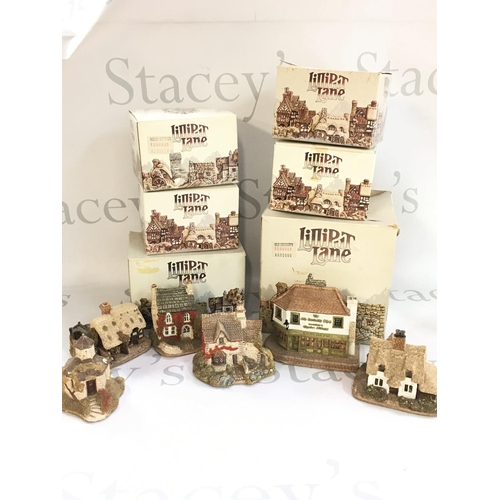 1051 - A Collection of boxed Lilliput lane resin cottage models. This lot cannot be posted