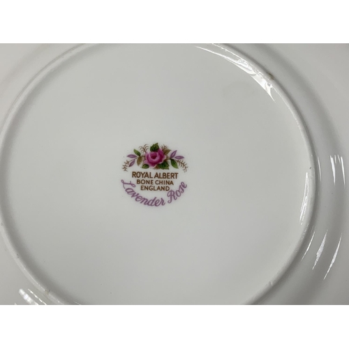 1058 - A Royal Albert Lavender rose tea and dinner service, approximately 67 pieces. (D)