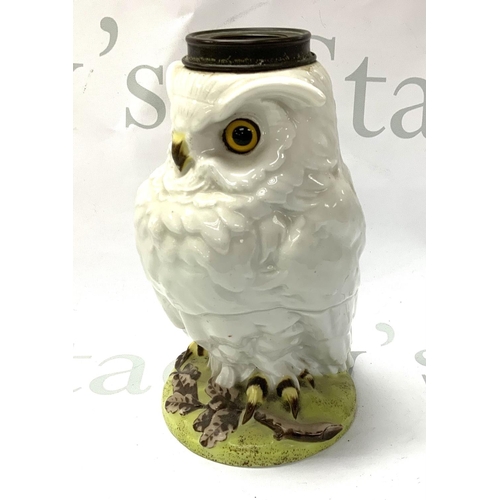 1060 - A William Whitley ceramic oil lamp with glass eyes. 18.5cm. (Top section missing).