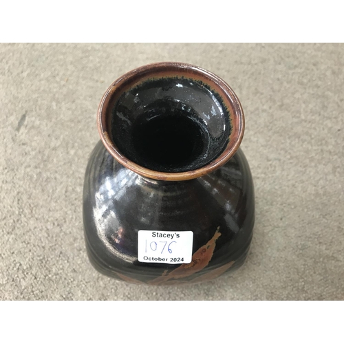 1076 - A David Leach stoneware brown glazed bottle vase. 25cm