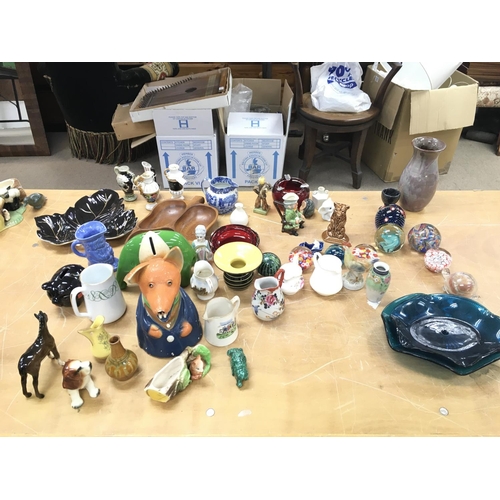 1092 - A collection of ceramics and glass ware including paperweights and a beswick horse.