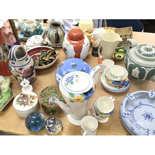 1106 - A large collection of ceramics and other oddments. Postage D