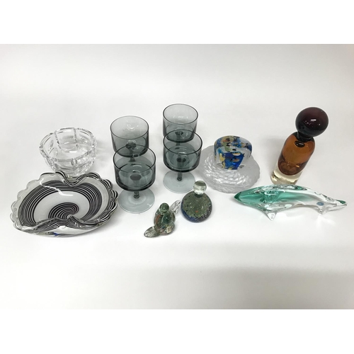 1116 - A collection of coloured and cut glass including some paperweights.