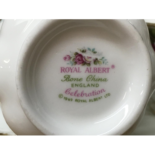 1138 - A Royal Albert celebration 1969 dinner set including dishes, plates, cups etc