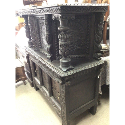 1215 - Withdrawn -A 17th Century carved oak Court Cupboard the top section with carved pillars and a single... 