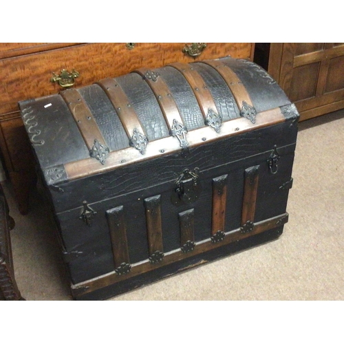 1229 - A quality Victorian dome top travelling trunk with wood and metal bound over leather. NO RESERVE