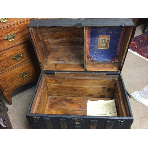 1229 - A quality Victorian dome top travelling trunk with wood and metal bound over leather. NO RESERVE