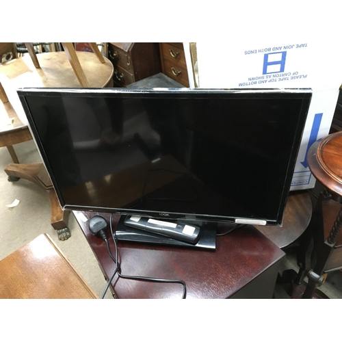 1244 - A JVC LT39DG52J 39 inch tv and a Logik tv 23inch. This lot cannot be posted. NO RESERVE