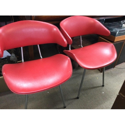 1252 - A set of four modern design chairs with tapering chrome legs . NO RESERVE