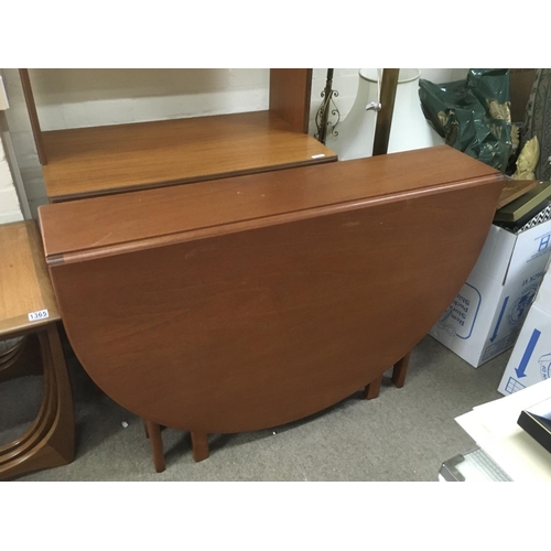 1271 - A drop leaf teak table, 74cm tall, 154cm wide. NO RESERVE