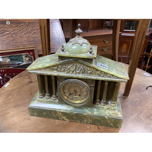 1275 - An Onyx and brass classical style mantle clock. Postage not available for this lot. NO RESERVE