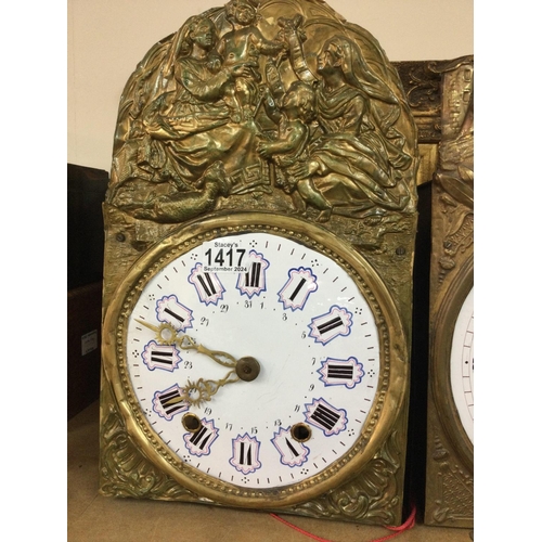 1279 - Two continental brass wall clocks with raised figures the enamel dial With Roman numerals with pendu... 