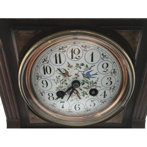 1293 - A Victorian mantle clock with pendulum. Winds and runs. 30cm tall by 19cm wide.