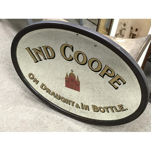 1294 - A vintage oval Ind Coppe On Draught & In bottle bar wall mirror, 63cm wide. This lot cannot be poste... 